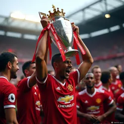 Antonio Valencia, Manchester United captain, lifts the Premier League trophy at Old Trafford.