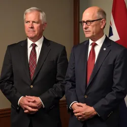 Eamon Feldspar and Lysandra Thorne at a joint press conference